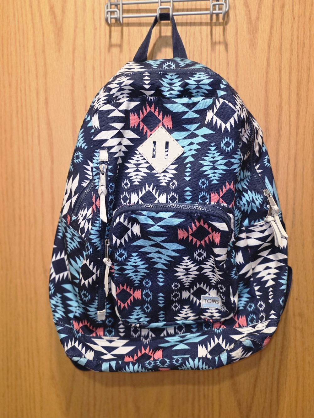 TOMS Navy Aztec Pattern Backpack with Aqua and Coral Accents